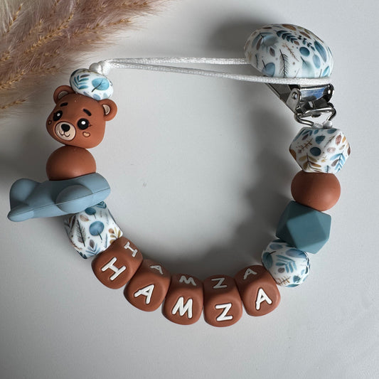 Speenkoord met naam beertje / vliegtuig / bruin / blauw