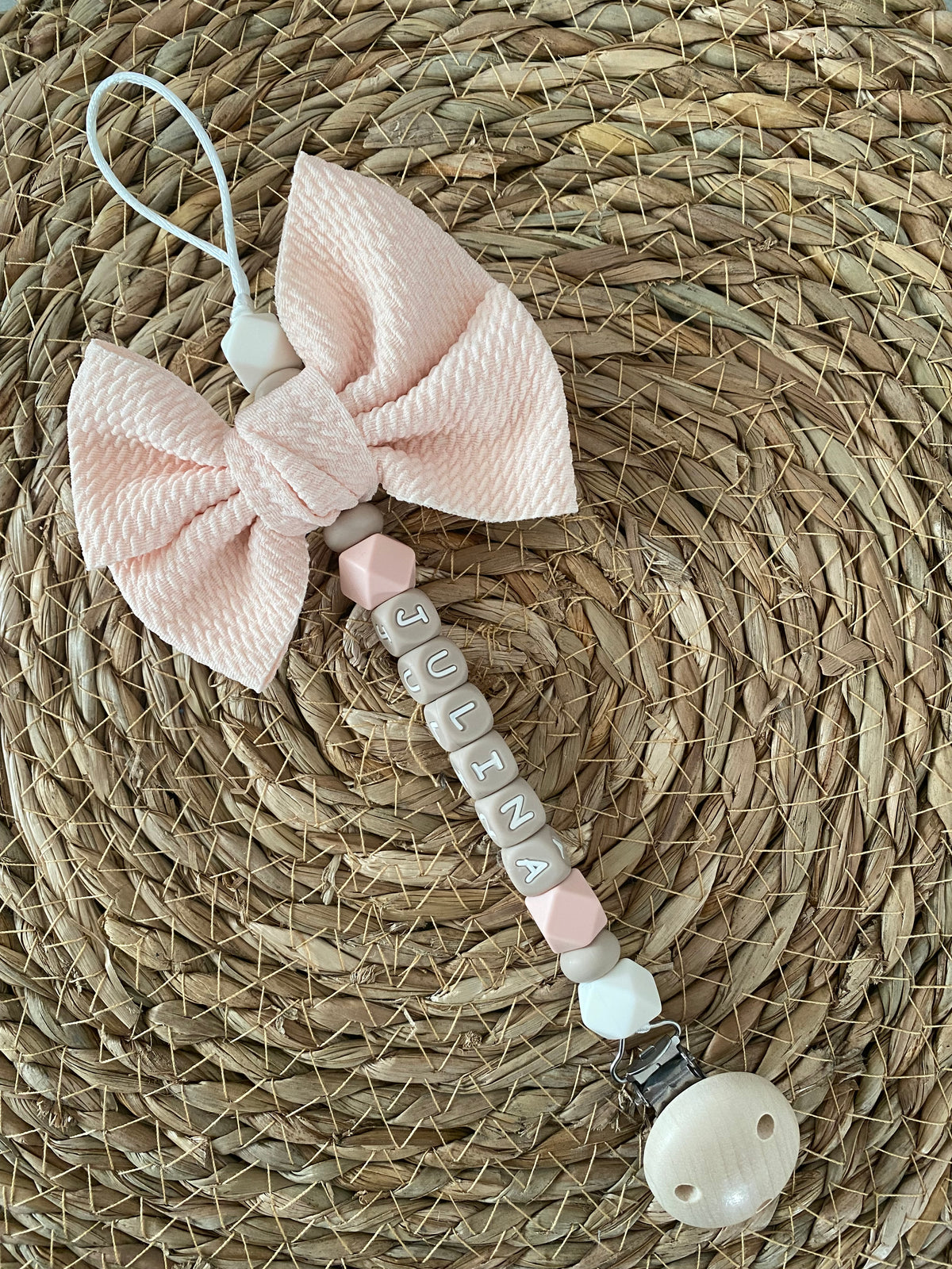 Speenkoord met strik beige / licht roze
