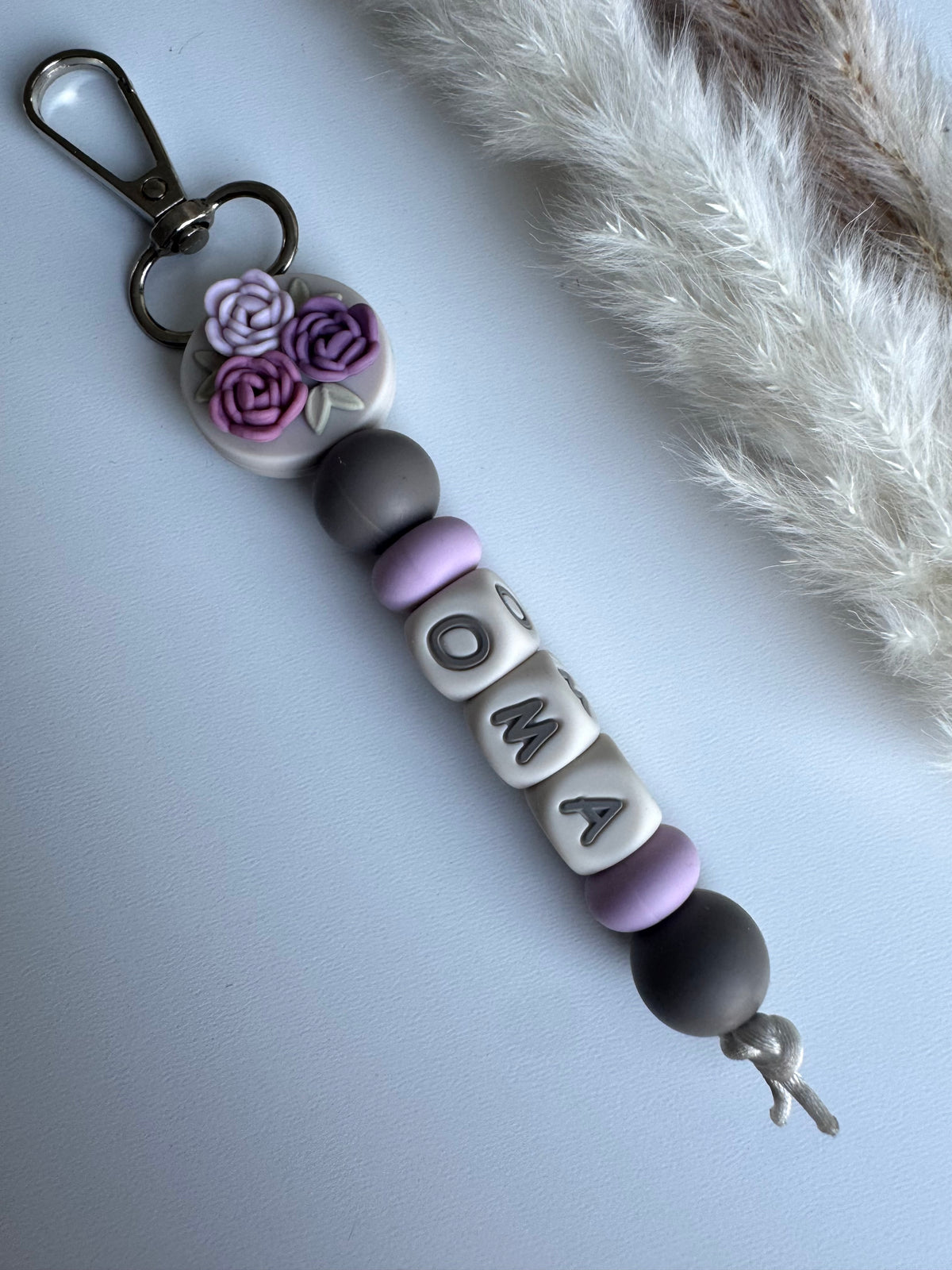 Sleutelhanger bloem / lila / roze