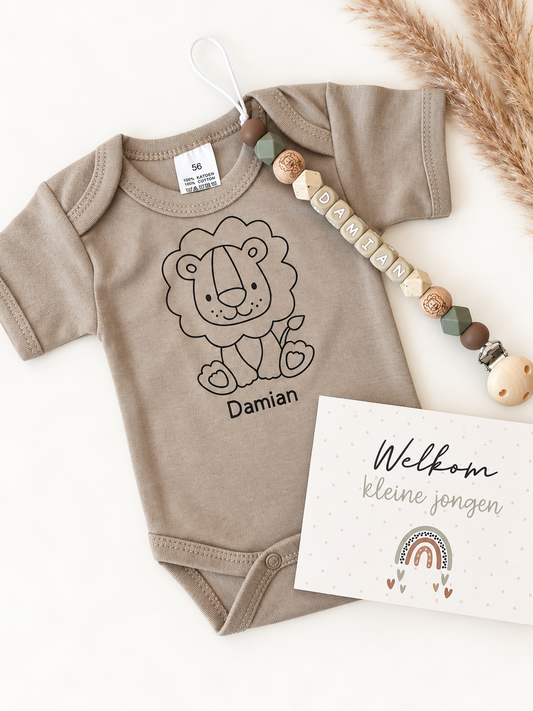Set romper met bijpassend speenkoord leeuw