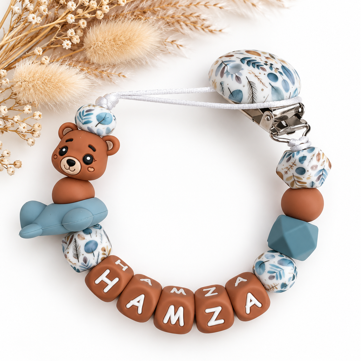 Speenkoord met naam beertje / vliegtuig / bruin / blauw