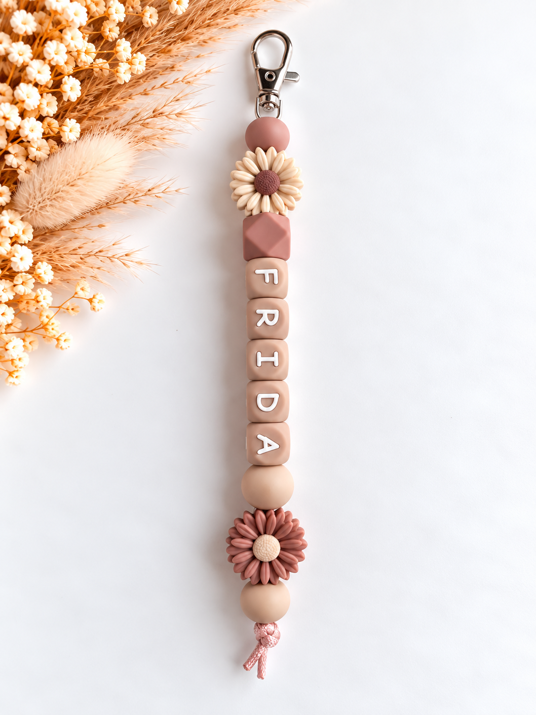 Sleutelhanger met naam bruin / bloemen