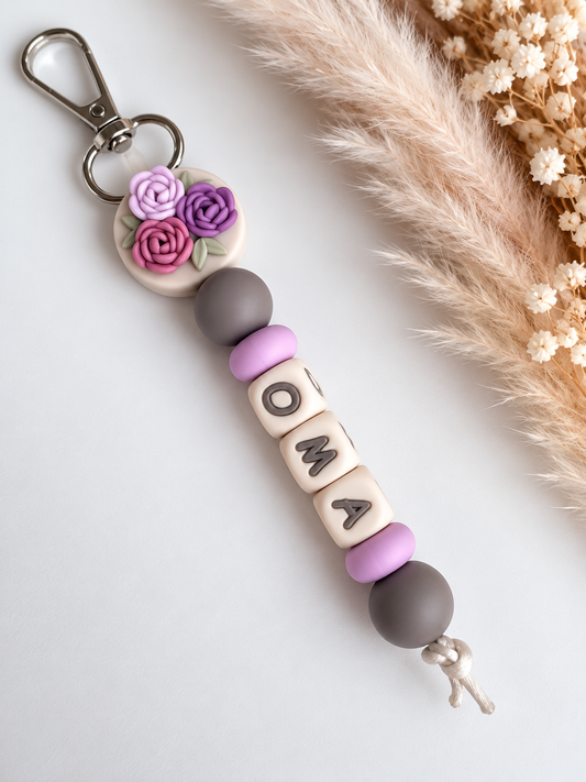 Sleutelhanger met naam bloem / lila / roze