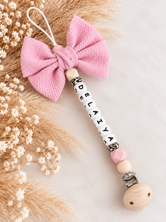 Speenkoord met strik licht roze / creme / panter