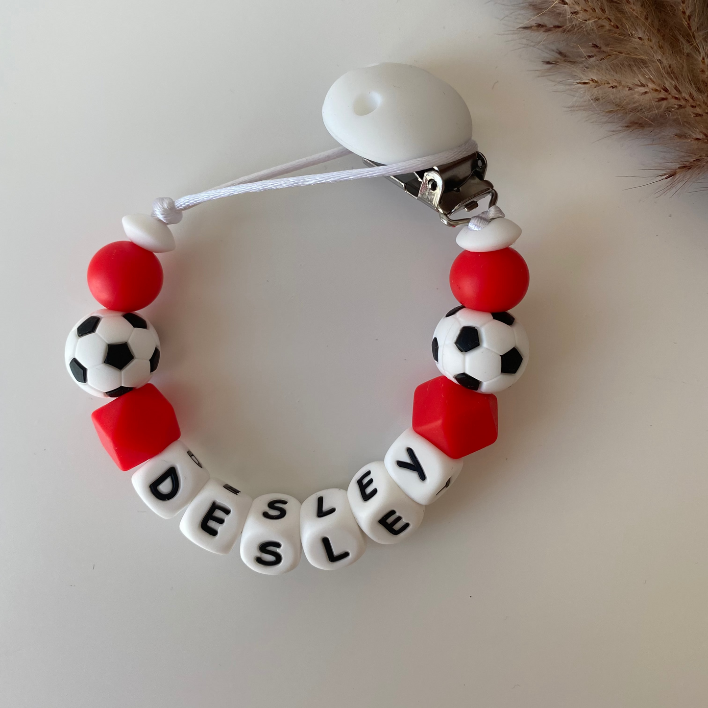 Speenkoord met naam rood / voetbal